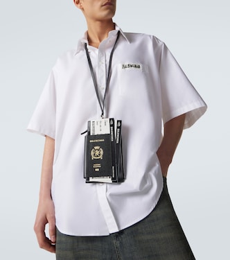 Leather-trimmed phone and passport holder in black - Balenciaga