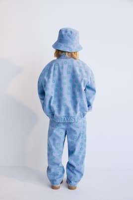 Smiley printed jeans | The New Society