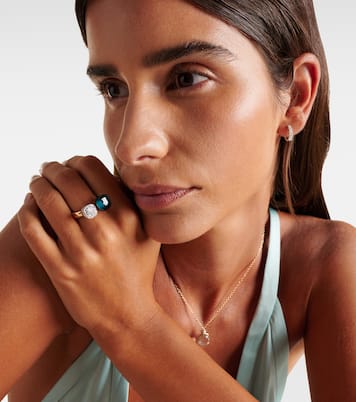 Anello Nudo in oro 18kt con topazio e diamanti | Pomellato