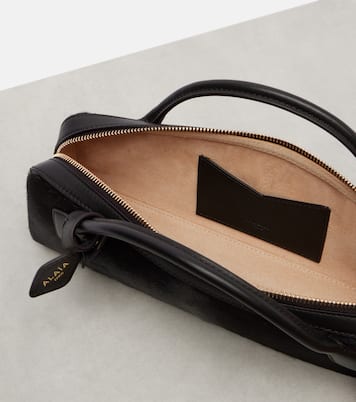 Le Teckel Small calf hair clutch | Alaïa
