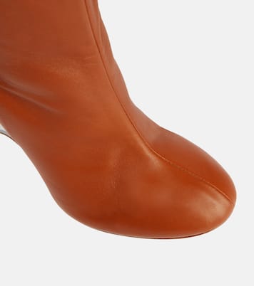 Leather knee-high boots | Alaïa