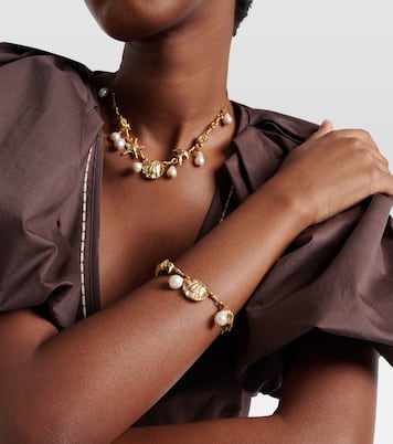 Faux pearl embellished charm bracelet | Alémais