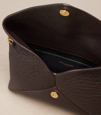 Cassandre Small leather clutch | Saint Laurent