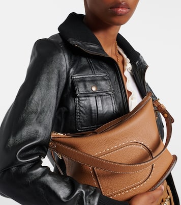 Schultertasche Pin Swing Surpiqué aus Leder | Delvaux