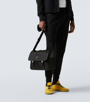 Re-Nylon leather-trimmed messenger bag | Prada