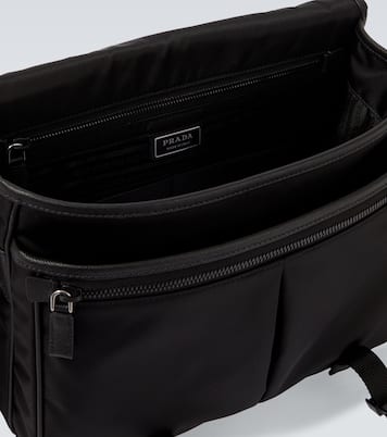 Re-Nylon leather-trimmed messenger bag | Prada
