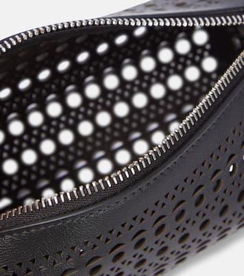 Tube perforated leather shoulder bag | Alaïa
