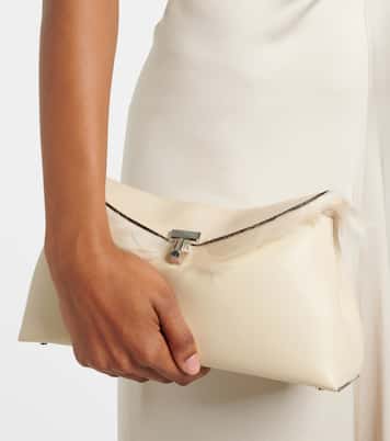 Clutch T-Lock aus Leder mit Shearling | Toteme