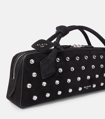 Le Teckel studded leather clutch | Alaïa