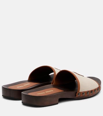 Logo leather-trimmed canvas clogs | Miu Miu