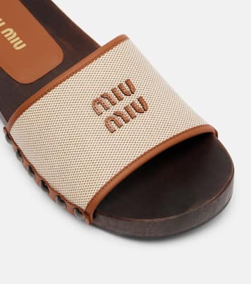 Logo leather-trimmed canvas clogs | Miu Miu