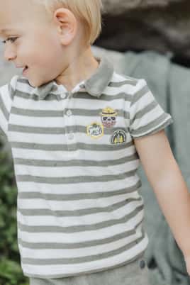 Striped cotton-blend terry polo shirt | Tartine et Chocolat