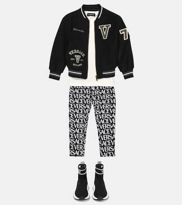 Logo print cotton jeans | Versace Kids