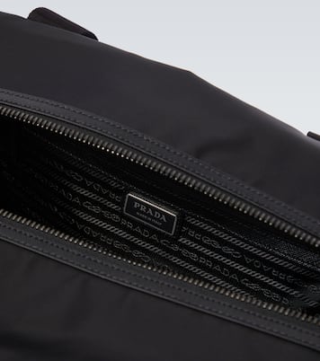 Re-Nylon leather-trimmed duffel bag | Prada