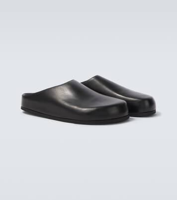 Wearing leather mules | Studio Nicholson