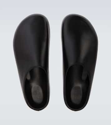 Wearing leather mules | Studio Nicholson