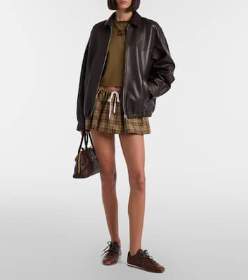 Plume leather sneakers  | Miu Miu