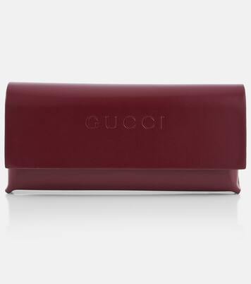 Embellished cat-eye glasses | Gucci