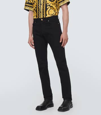 جينز بقصّة مستقيمة وخصر متوسط مع تزيين | Versace