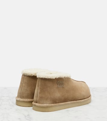 Shearling-lined suede ankle boots | Miu Miu