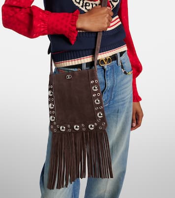 Nellcôte Small fringed suede shoulder bag | Valentino Garavani