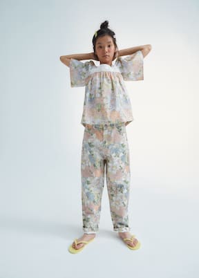 Jeans Irvine | The New Society