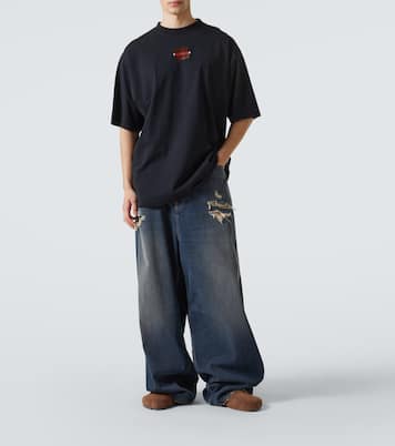 Distressed mid-rise wide-leg jeans | Balenciaga