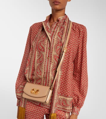 Pochette Vain Small en cuir | Valentino Garavani