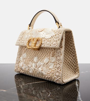 VSling Mini embellished top-handle bag | Valentino Garavani