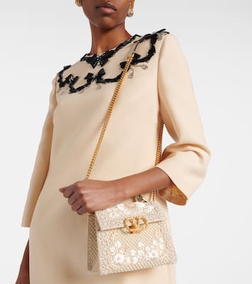 VSling Mini embellished top-handle bag | Valentino Garavani