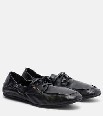 Shuffle leather boat shoes | Prada