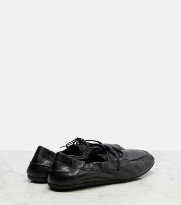 Shuffle leather boat shoes | Prada