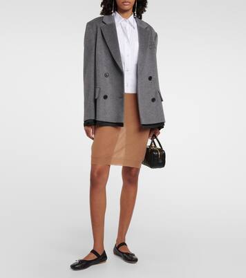 Logo knitted midi skirt | Miu Miu