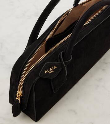 Le Teckel suede clutch | Alaïa