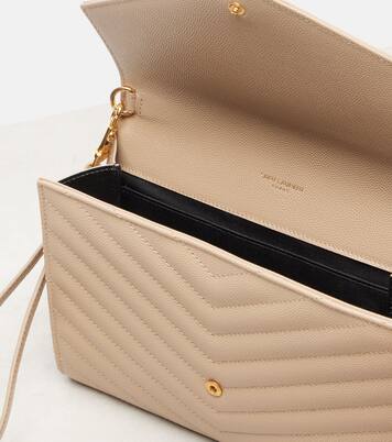 Cassandre Small matelassé leather clutch | Saint Laurent