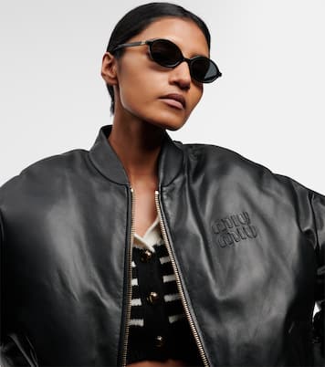 Occhiali da sole rotondi con logo | Miu Miu