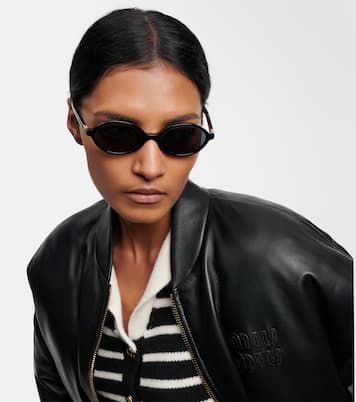 Occhiali da sole rotondi con logo | Miu Miu