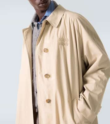 Trench-coat en gabardine de coton à logo | Miu Miu