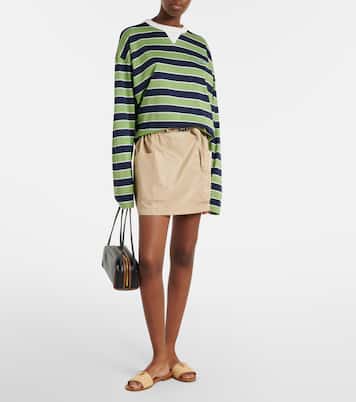 Mules en raphia à finitions en cuir | Prada