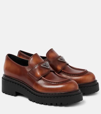 Logo leather platform loafers | Prada