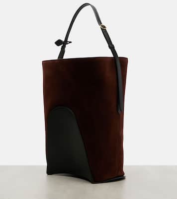 Hip Large leather-trimmed suede bucket bag | Alaïa