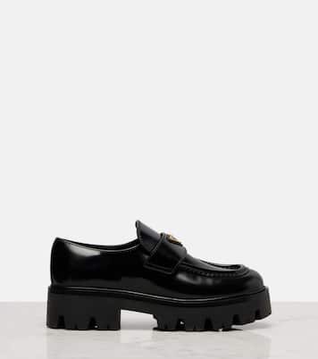 Logo leather platform loafers | Prada
