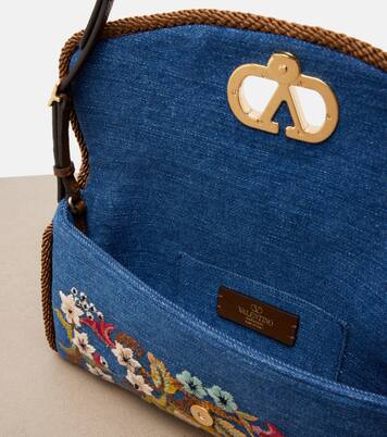 DeVain Small embroidered denim shoulder bag | Valentino Garavani