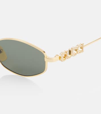Ovale Sonnenbrille mit Kristallen | Gucci
