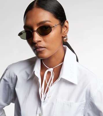 Ovale Sonnenbrille mit Kristallen | Gucci