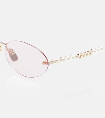 Logo embellished oval sunglasses | Gucci
