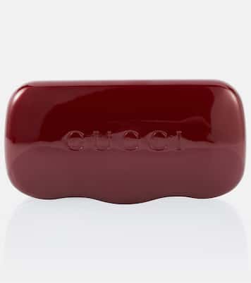 Logo embellished oval sunglasses | Gucci