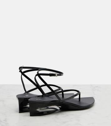 Invisible patent leather thong sandals | Alaïa