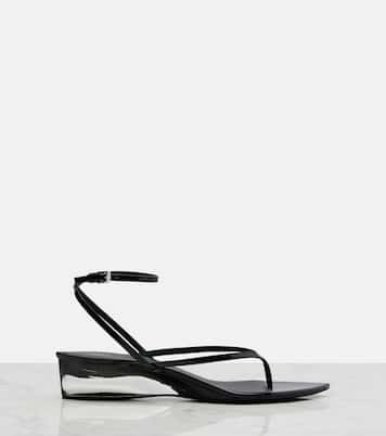 Invisible patent leather thong sandals | Alaïa