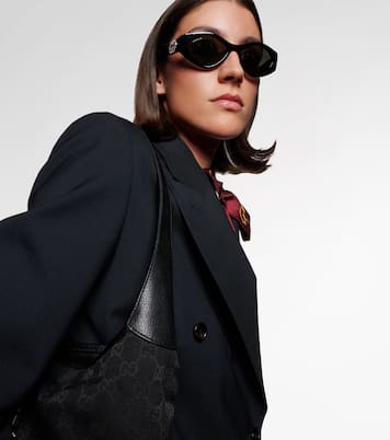 Interlocking G crystal-embellished oval sunglasses | Gucci